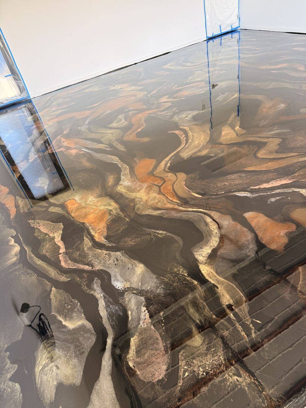 Copper and onyx metallic floor
