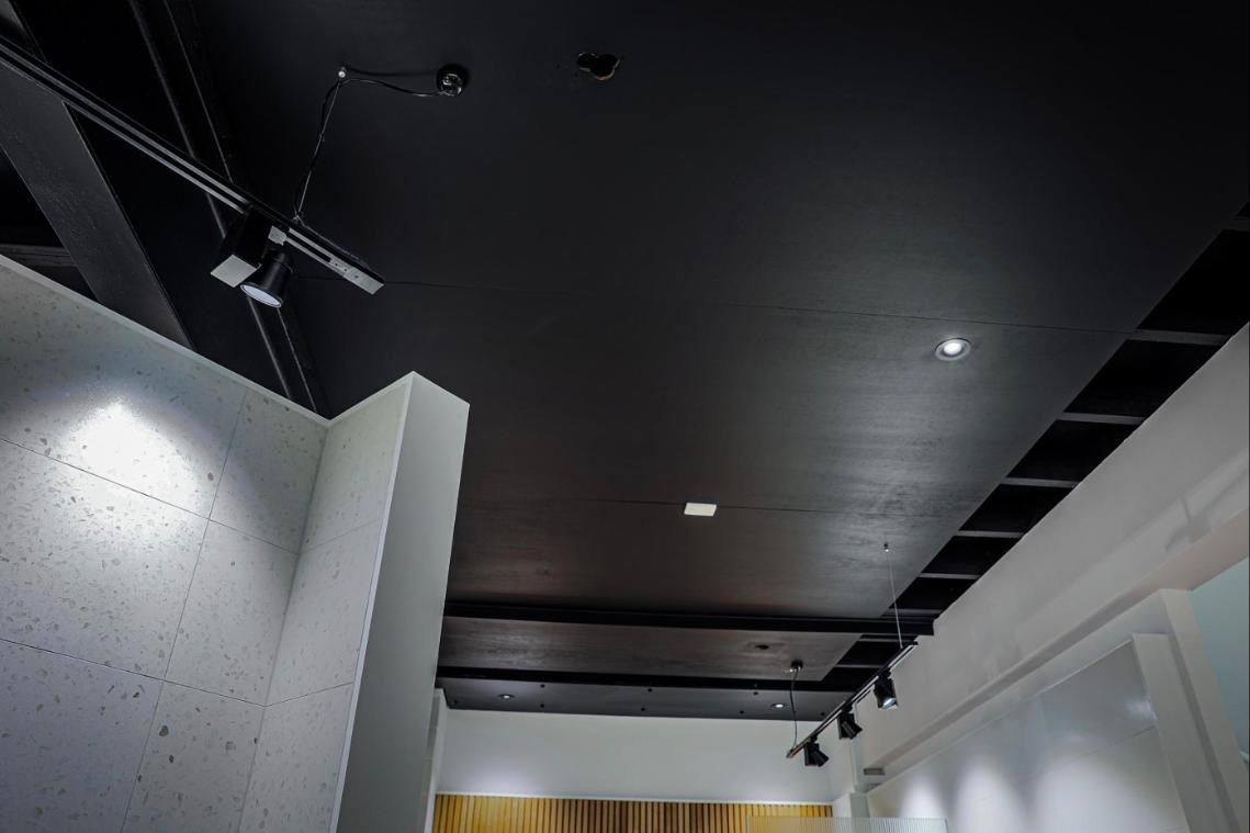 Showroom with black ceiling